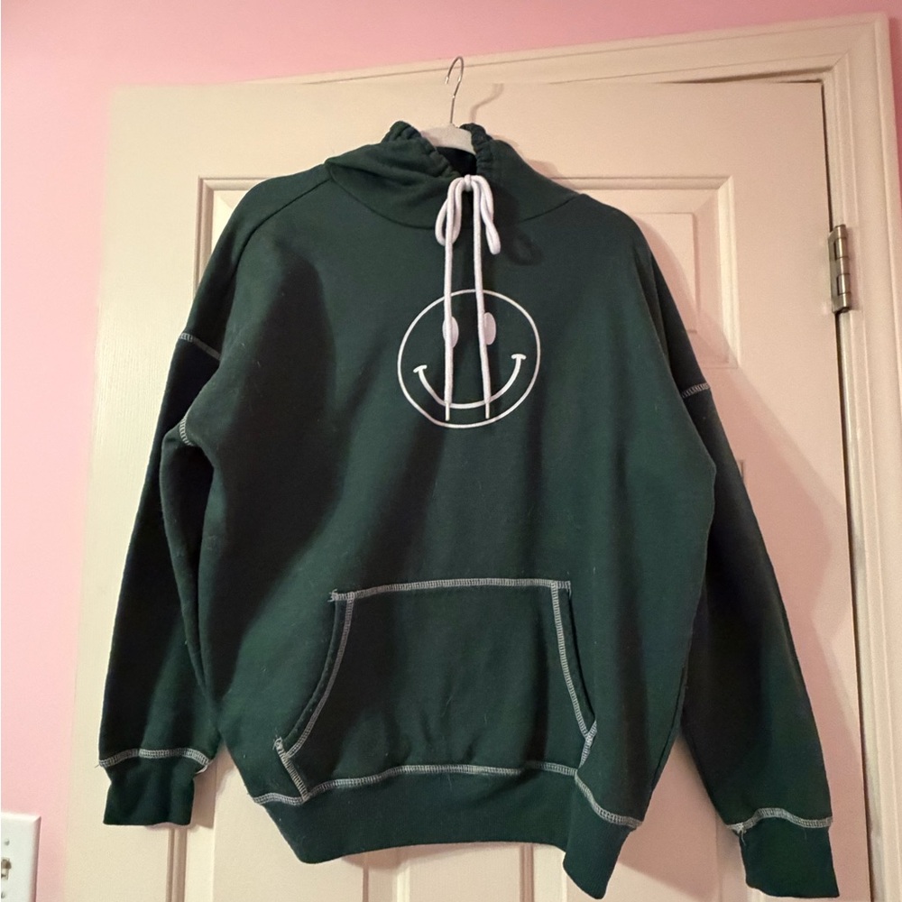 Woman Justify Green Hoodie with Smiley Face
